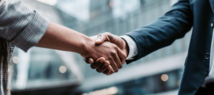 Business handshake representing trust and secure transactions